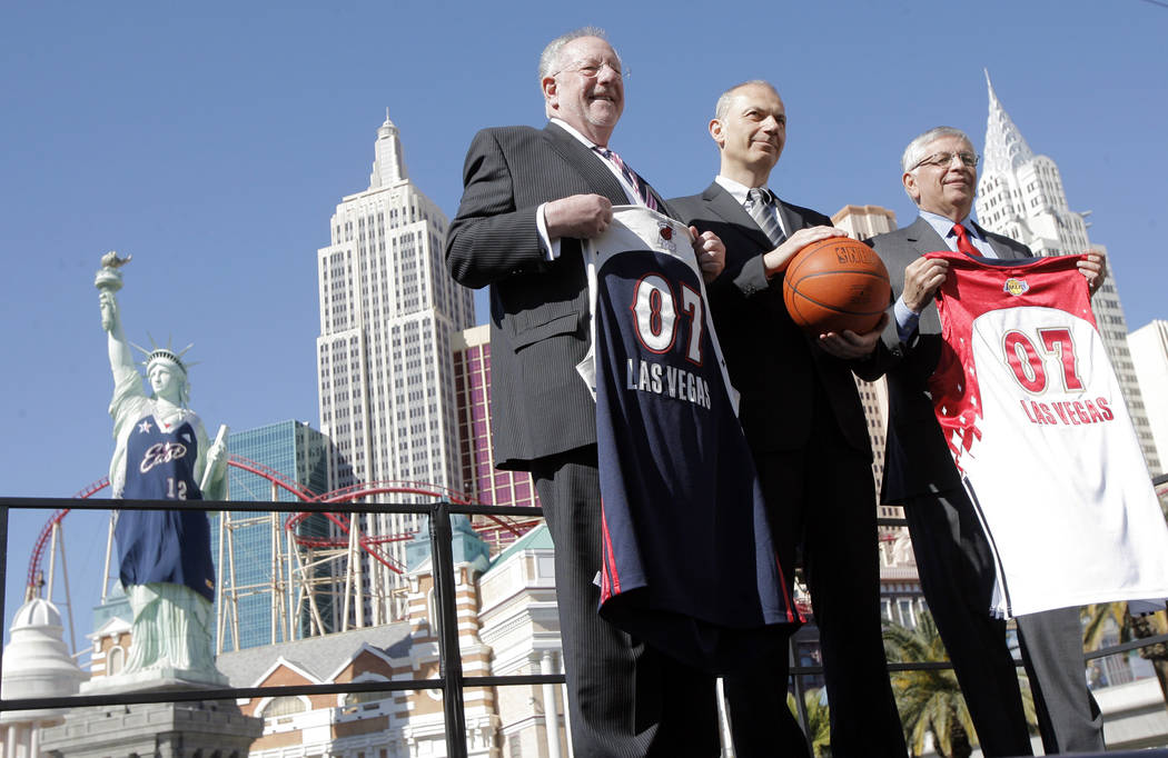 NBA Commissioner David Stern, from right, Erich Stamminger, center, president and CEO of Adidas ...