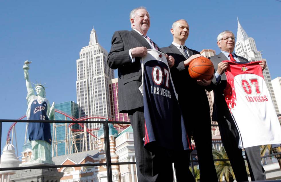 NBA Commissioner David Stern, from right, Erich Stamminger, center, president and CEO of Adidas ...