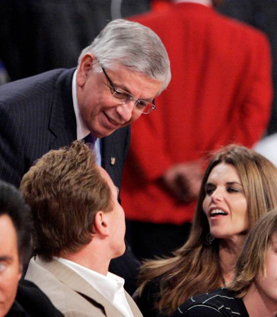 NBA commissioner David Stern, top, talks to California Gov. Arnold Schwarzenegger and his wife ...