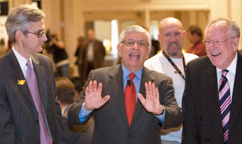 NBA Commissioner David Stern, center, talks to Clark County Commissioner Rory Reid, left, and L ...