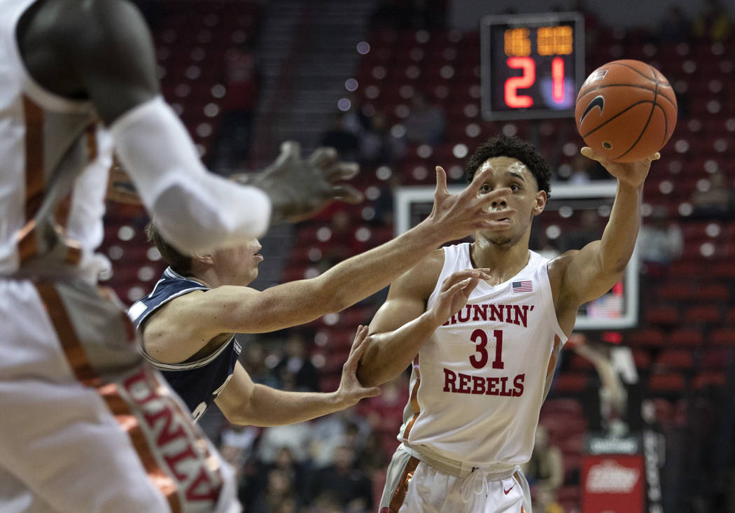 UNLV's guard Marvin Coleman (31) looks to pass to a teammate during the first half of the game ...