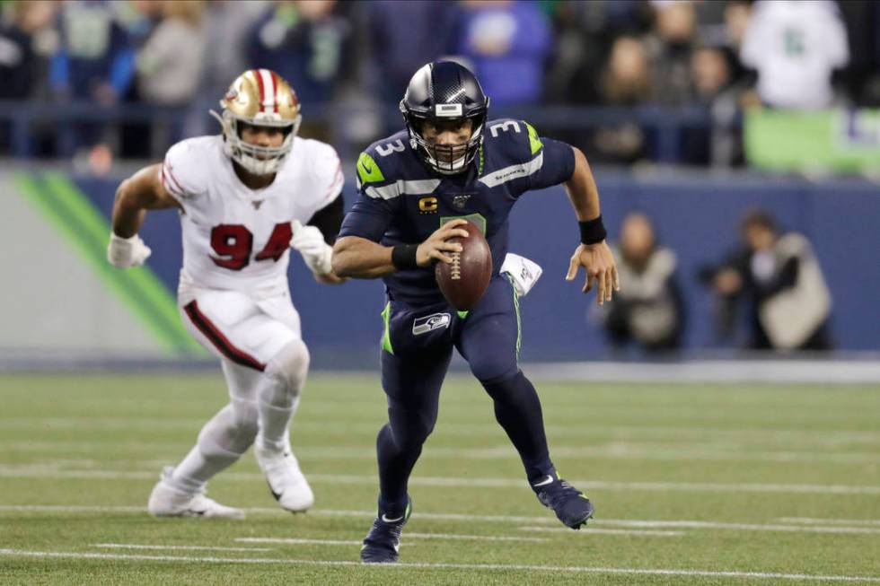 Seattle Seahawks quarterback Russell Wilson in action against the San Francisco 49ers during th ...