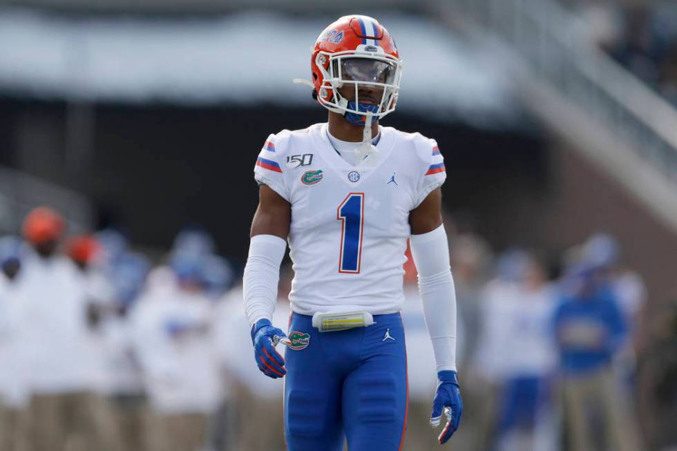 Florida defensive back CJ Henderson takes up his position during the first half of an NCAA coll ...