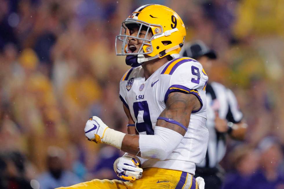 In this Sept. 29, 2018, file photo, LSU safety Grant Delpit (9) celebrates his sack of Mississi ...