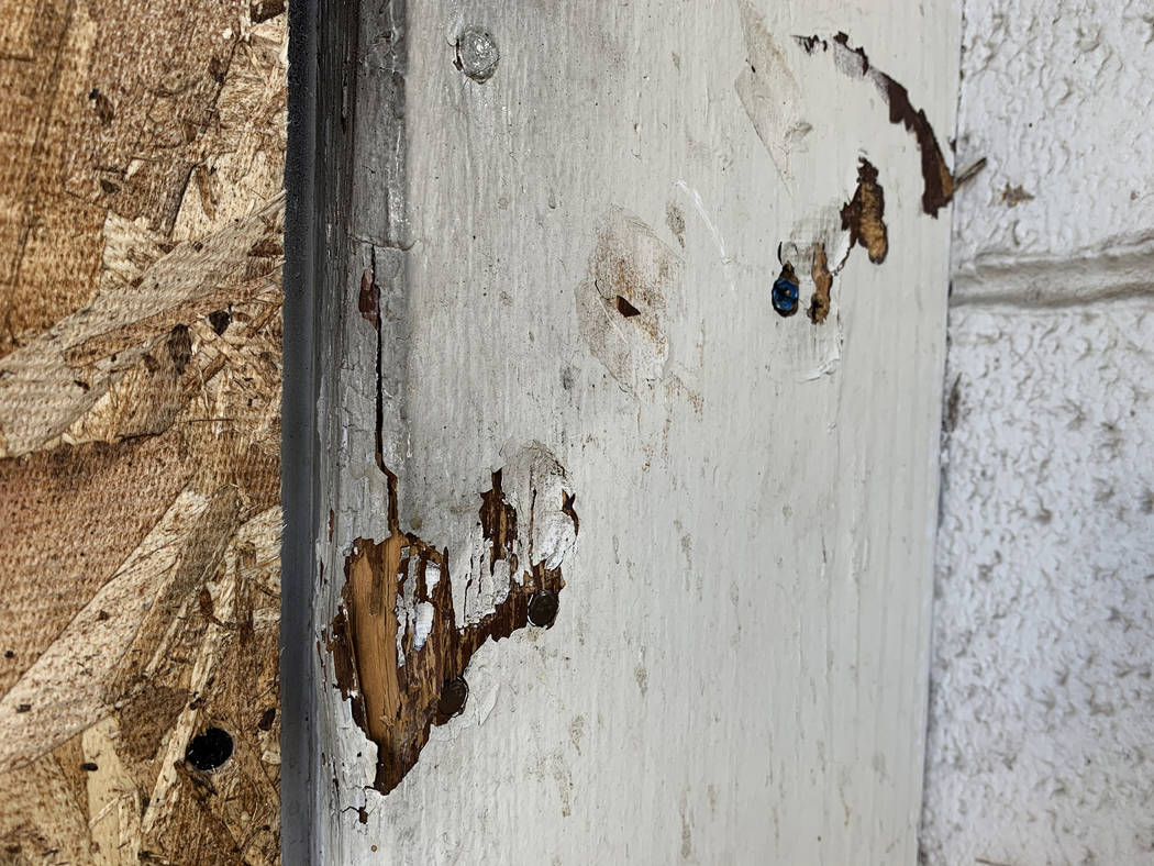 Indentations show where the rear door of the Alpine Motel Apartments was bolted shut, pictured ...