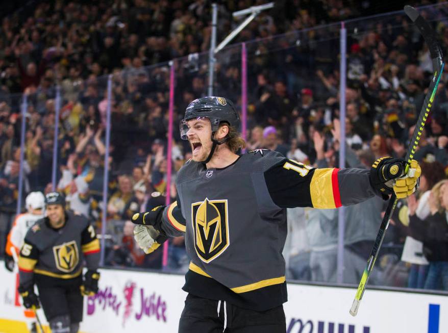 Vegas Golden Knights defenseman Jon Merrill (15) celebrates after scoring a goal in the first p ...