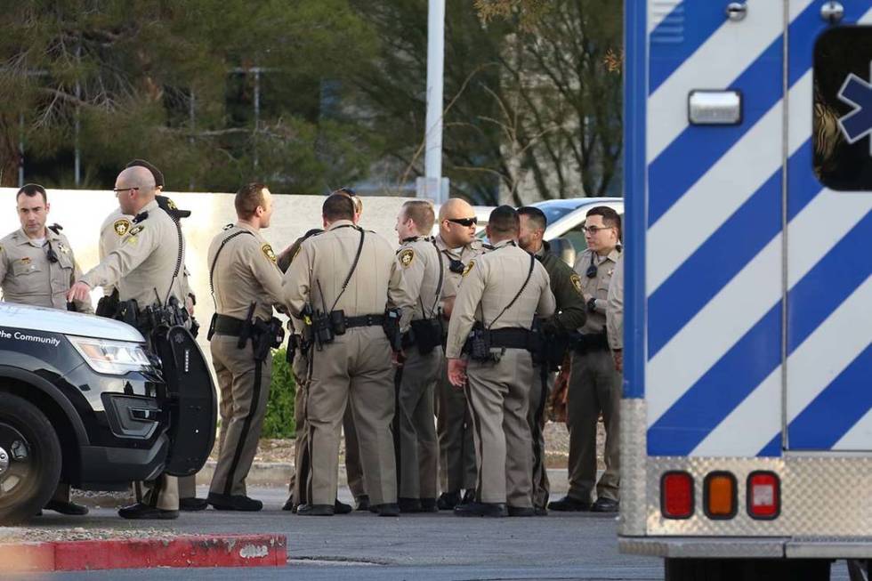 Las Vegas police deal with a woman barricaded in a vehicle in a parking lot at University Medic ...