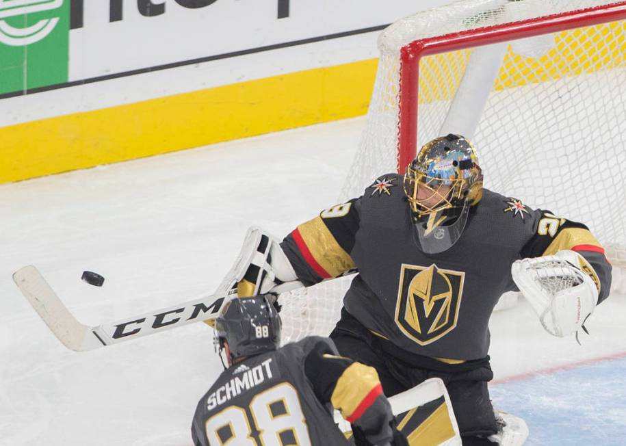 Vegas Golden Knights goaltender Marc-Andre Fleury (29) makes a save with Vegas Golden Knights d ...