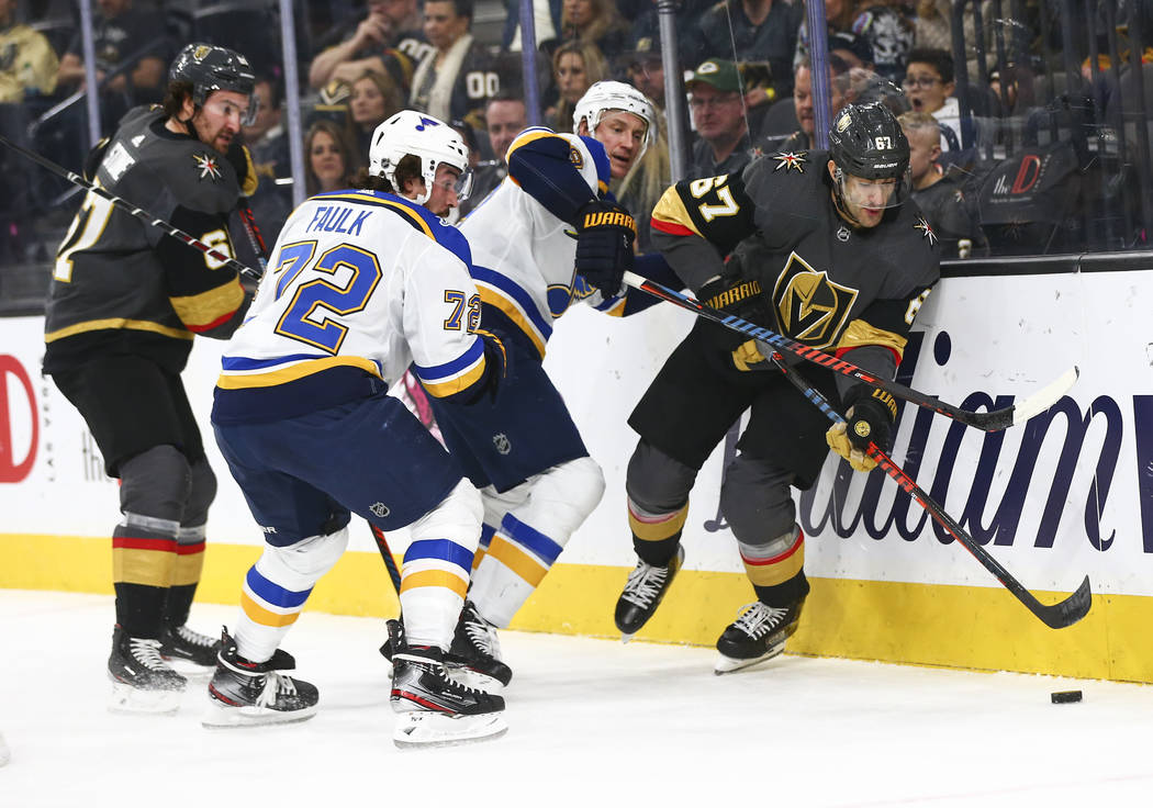 Golden Knights' left wing Max Pacioretty (67) skates with the puck past St. Louis Blues' St. Lo ...