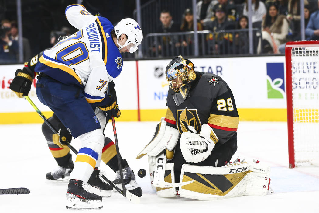 Golden Knights goaltender Marc-Andre Fleury (29) blocks the puck against St. Louis Blues' Oskar ...