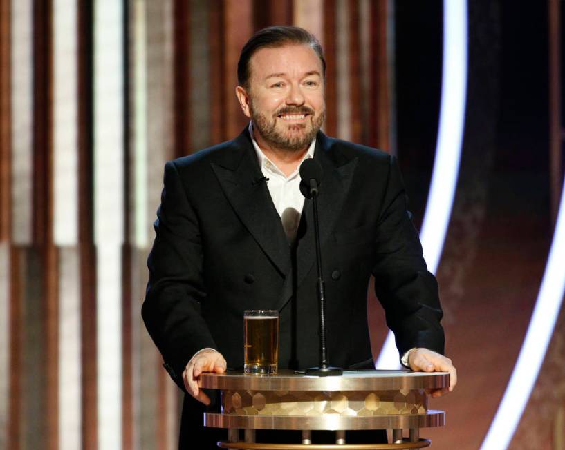 This image released by NBC shows host Ricky Gervais speaking at the 77th Annual Golden Globe Aw ...