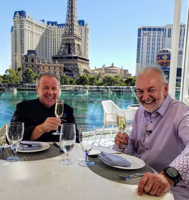 Julian Serrano (left) and Hubert Keller sip champagne suring the filming of "Hubert Keller: Sec ...