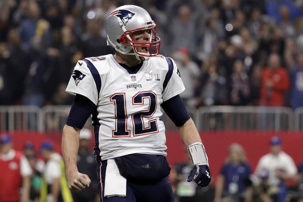 New England Patriots' Tom Brady celebrates a touchdown during the second half of the NFL Super ...