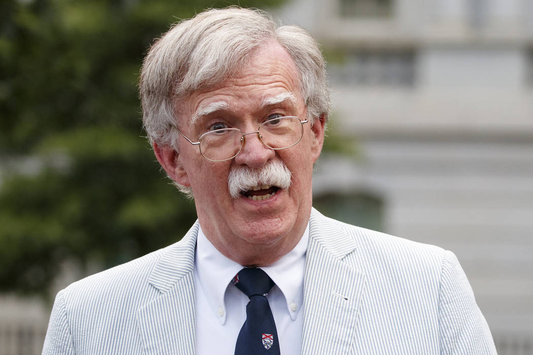 FILE - In this July 31, 2019 file photo, then National security adviser John Bolton speaks to m ...