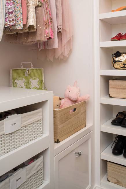 Bins and baskets are perfect for storing children's toys and accessories. (LA Closet Design)