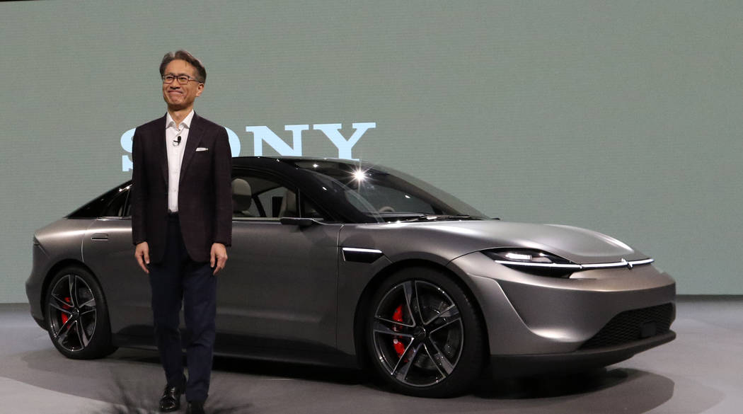 Sony Corporation CEO Kenichiro Yoshida poses in front of the Vision-S sedan, a car protoype cre ...