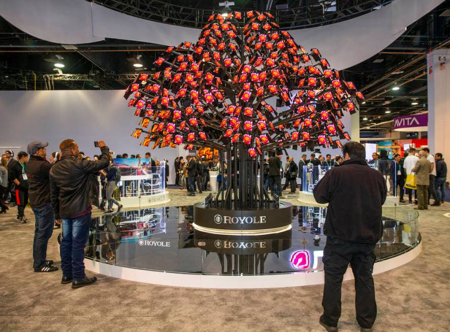 A video screen tree by Royole about their products on display during CES Day 1 in Central Hall ...