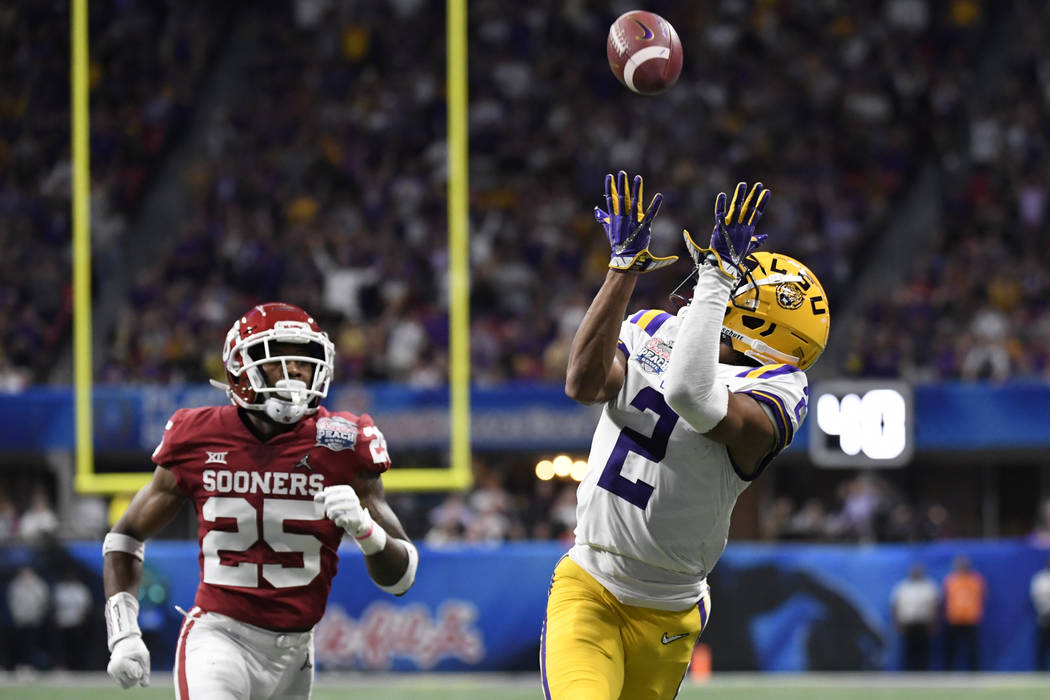 LSU wide receiver Justin Jefferson (2) prepares for a touchdown catch against Oklahoma safety J ...