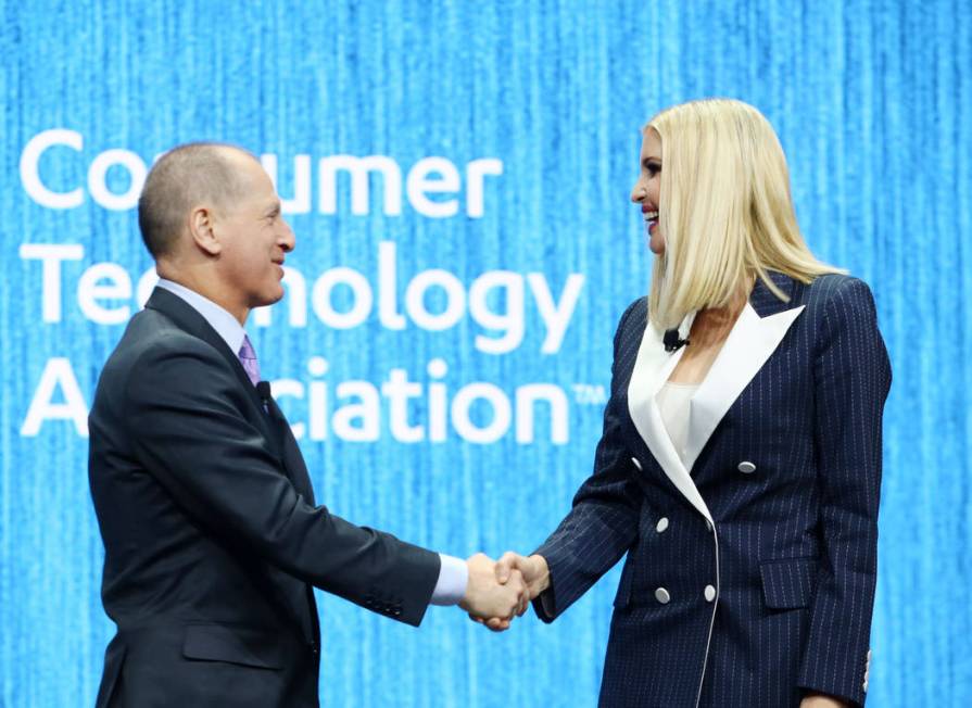 Gary Shapiro, president and CEO of the Consumer Technology Association, shakes Ivanka Trump's h ...