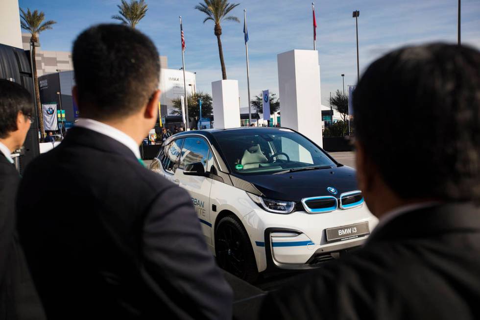 The BMW i3 Urban Suite self-driving electric vehicle drives a passenger at CES at the Las Vegas ...