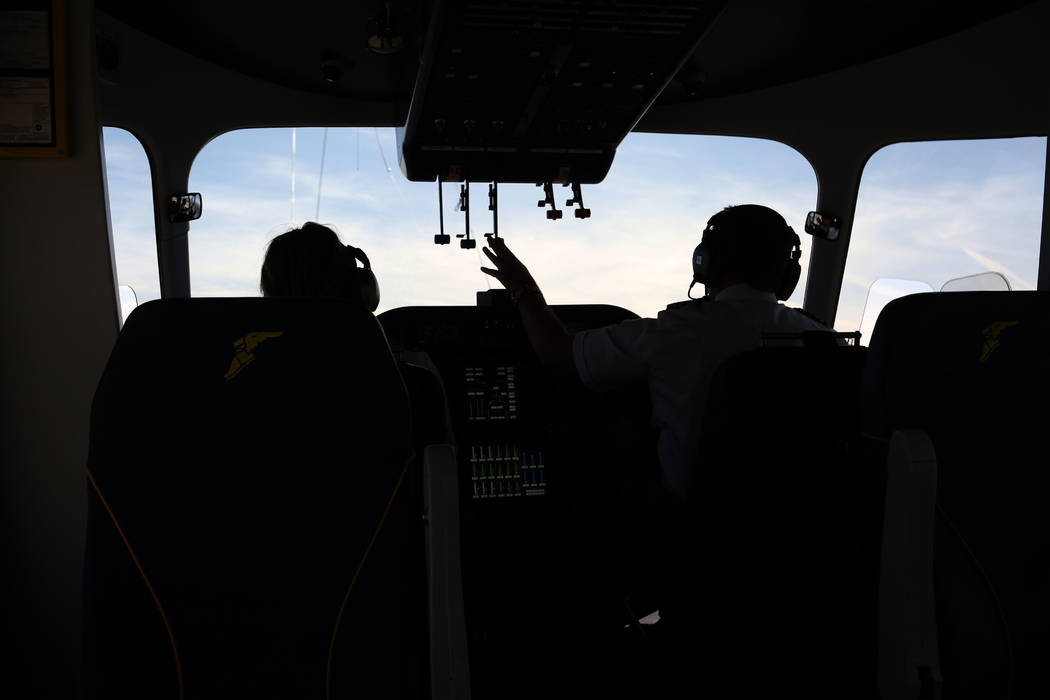 William Bayliss, right, Chief Pilot of Goodyear Blimp Wingfoot Three and Assistant Chief Pilot, ...