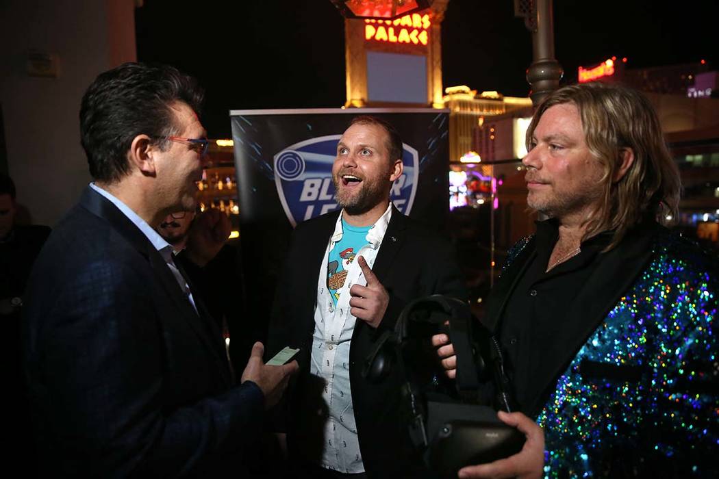 Las Vegas Review-Journal columnist John Katsilometes, left, talks virtual reality Chicken Waffl ...