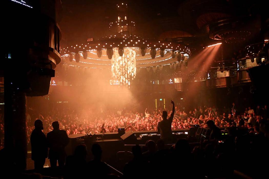 Conventioneers and clubgoers dance to DJ Mark Eteson during the CES 2020 official opening party ...