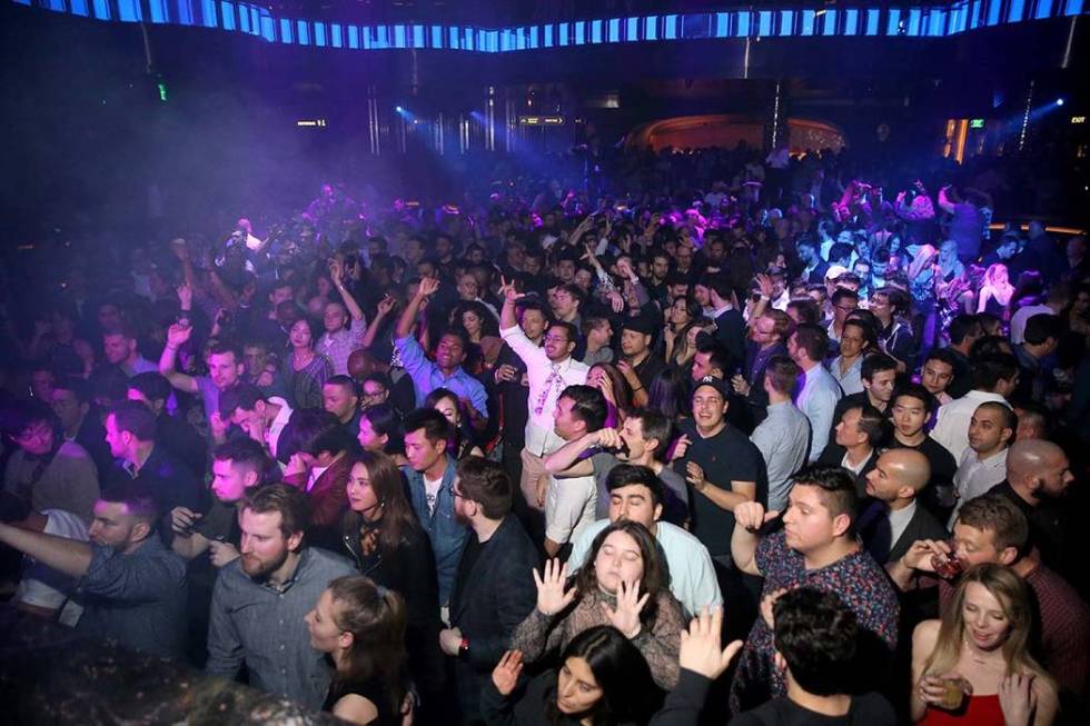 Conventioneers and clubgoers during the CES 2020 official opening party in the Main Room at Omn ...