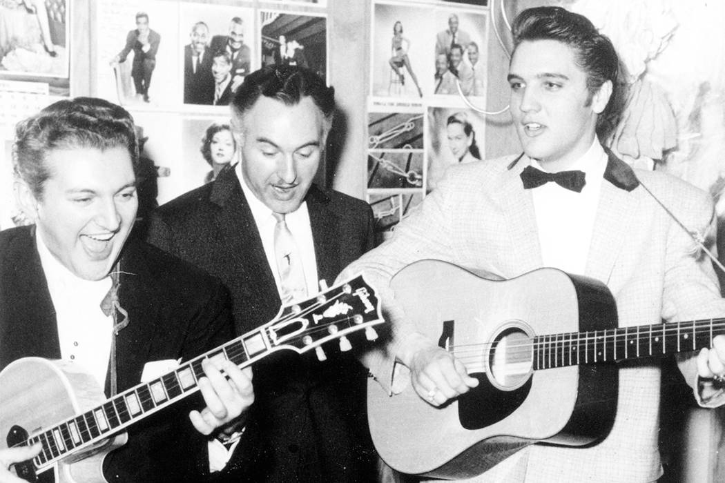 Liberace, left, is shown with his brother George Liberace, center, and Elvis Presley, at the Ne ...