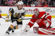 Vegas Golden Knights center Cody Eakin (21) skates by Detroit Red Wings goaltender Jonathan Ber ...