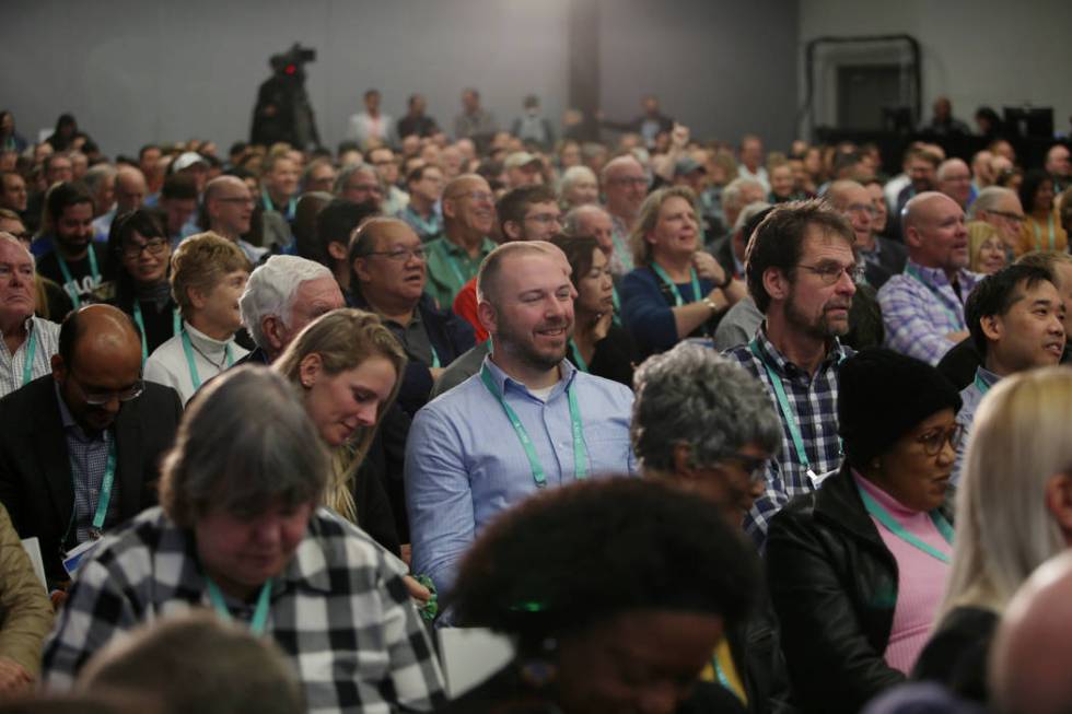 CES attendees watch contenders for the Last Gadget Standing at the Las Vegas Convention Center ...