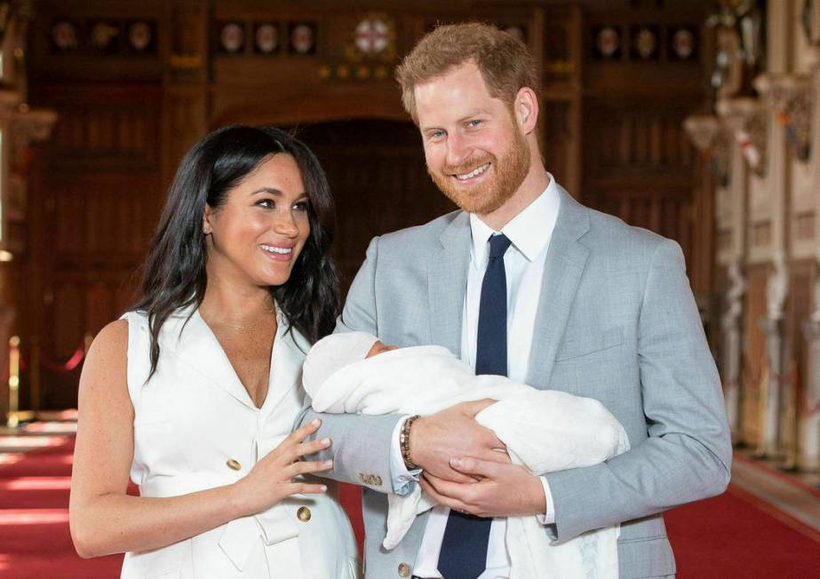 FILE - In this Wednesday May 8, 2019 file photo, Britain's Prince Harry and Meghan, Duchess of ...