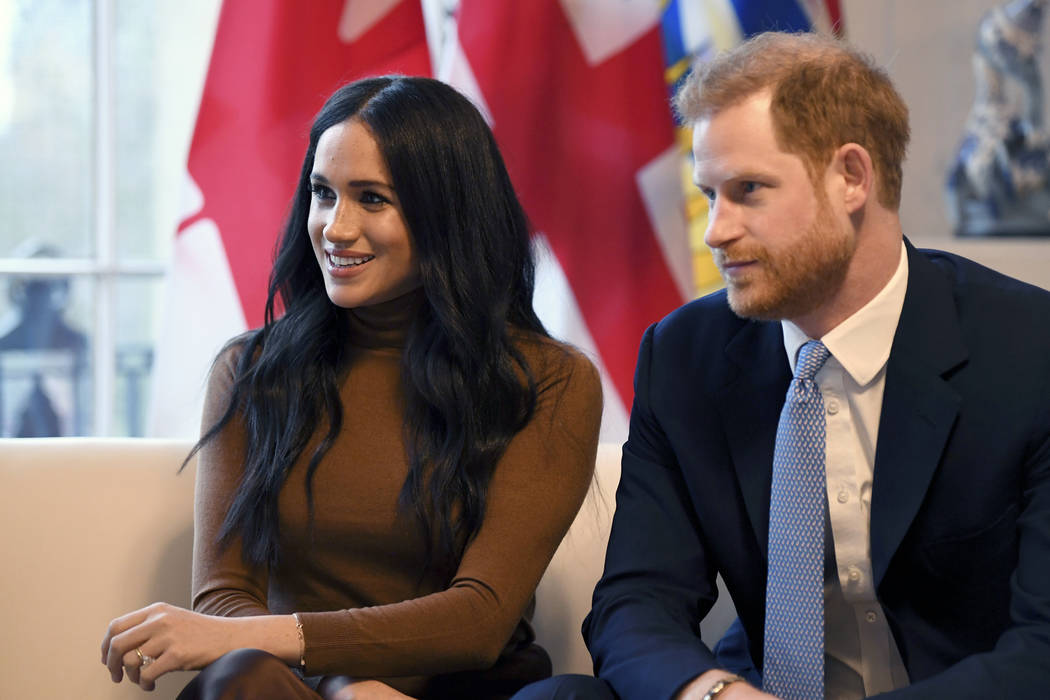 FILE - In this Tuesday, Jan. 7, 2020 file photo, Britain's Prince Harry and Meghan, Duchess of ...