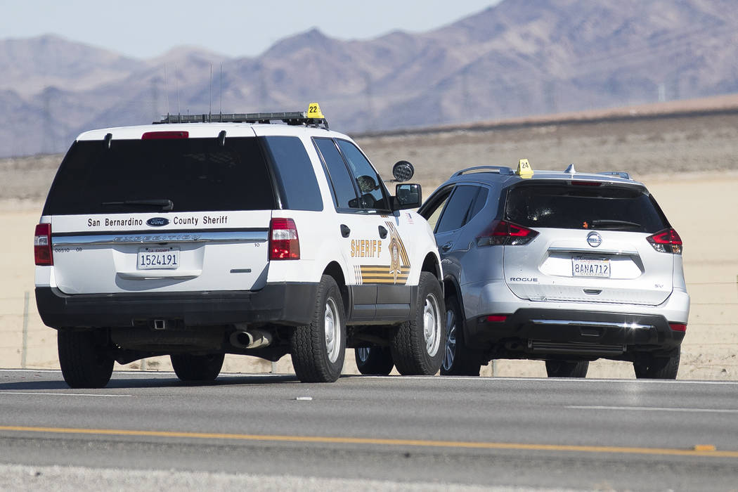 The suspect's car at the scene of a fatal officer-involved shooting south of Primm on northboun ...