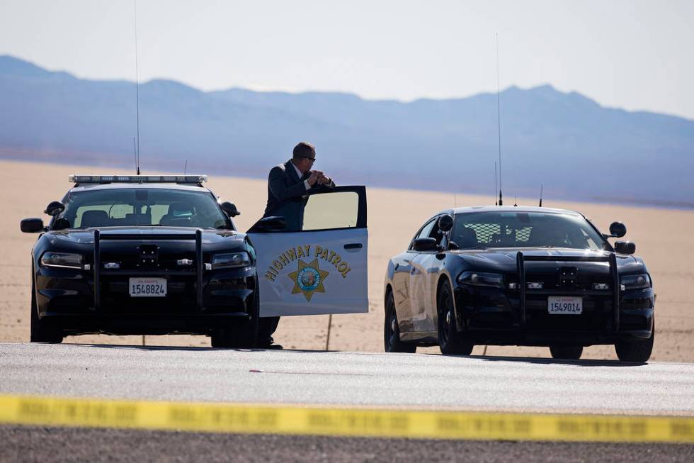 Police work the scene of a fatal officer-involved shooting south of Primm on northbound Interst ...