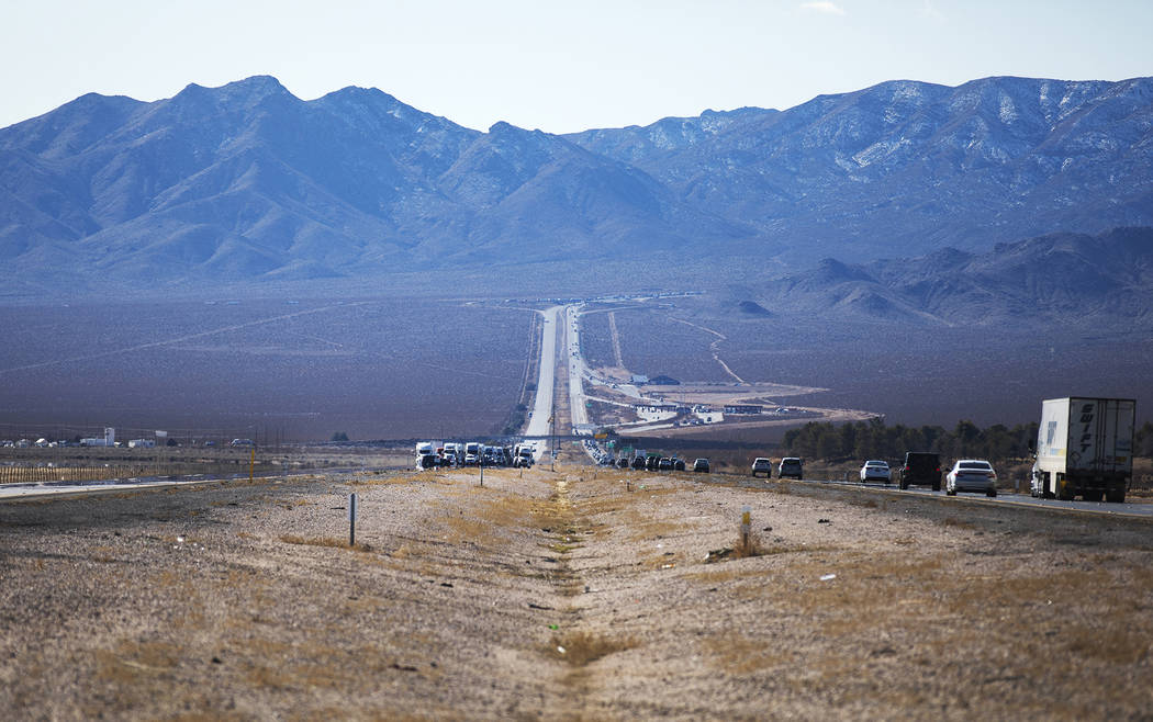 Motorists are stuck on northbound Interstate 15 ahead of where the police are working the scene ...