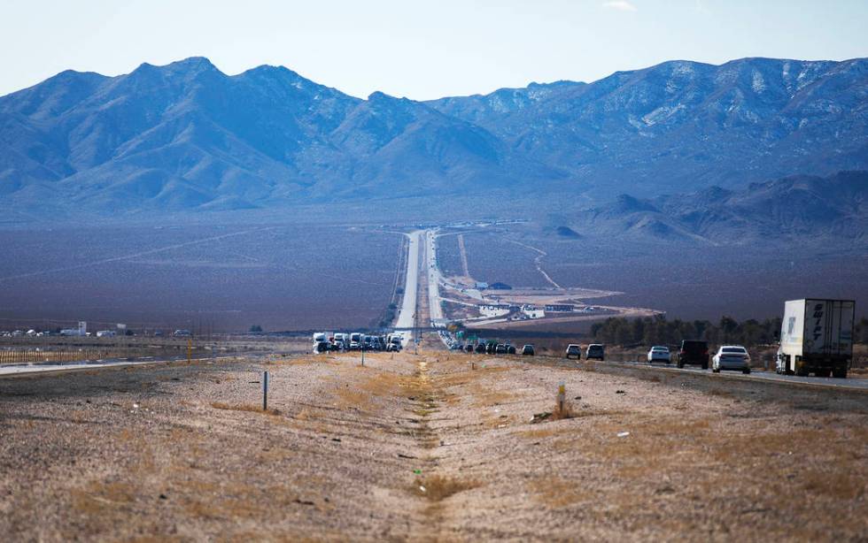 Motorists are stuck on northbound Interstate 15 ahead of where the police are working the scene ...