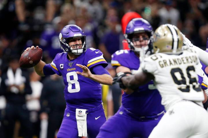 Minnesota Vikings quarterback Kirk Cousins (8) passes under pressure from New Orleans Saints de ...