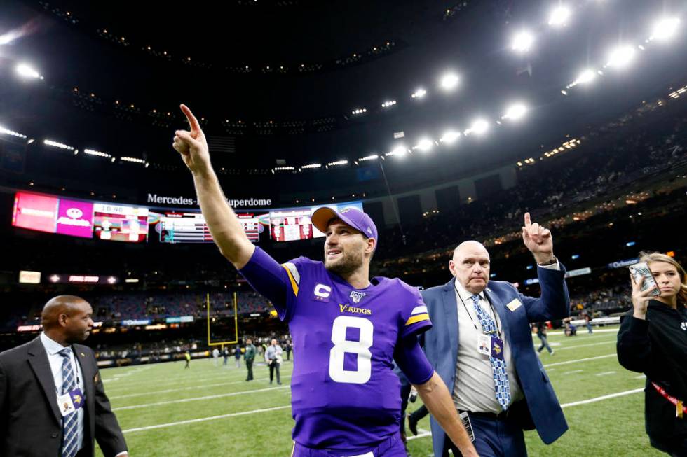 Minnesota Vikings quarterback Kirk Cousins (8) reacts as he walks off the field after their ove ...
