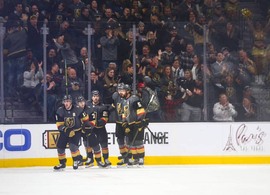 The Golden Knights celebrate goal by Reilly Smith (19) during the second period of an NHL hocke ...