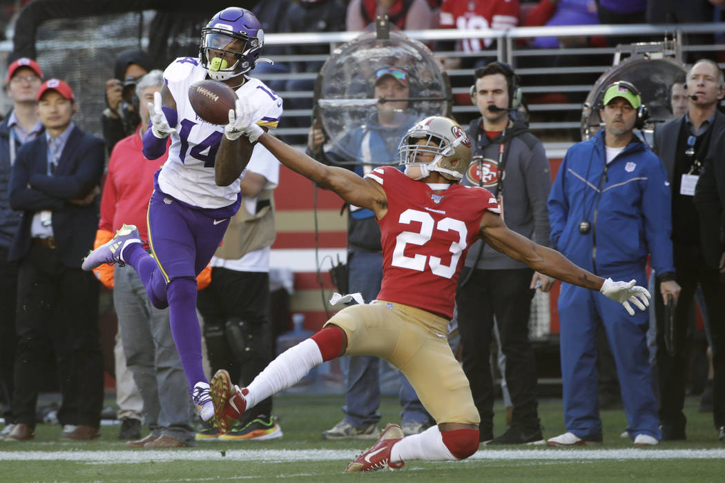 Minnesota Vikings wide receiver Stefon Diggs (14) catches a touchdown pass in front of San Fran ...