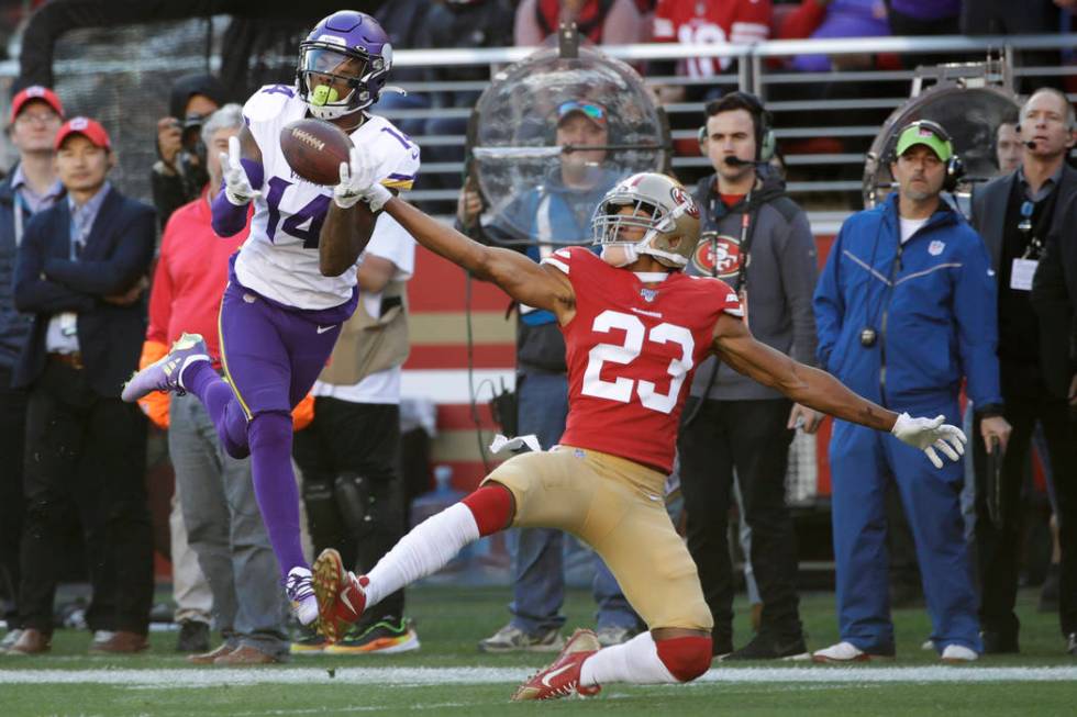 Minnesota Vikings wide receiver Stefon Diggs (14) catches a touchdown pass in front of San Fran ...