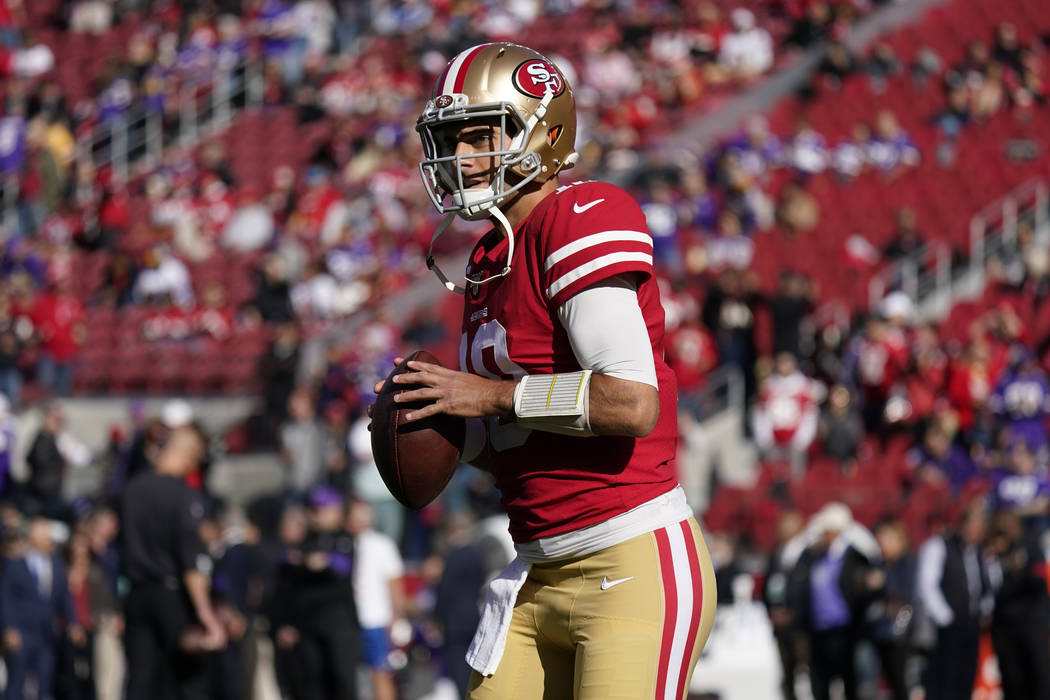 San Francisco 49ers quarterback Jimmy Garoppolo (10) warms up before an NFL divisional playoff ...
