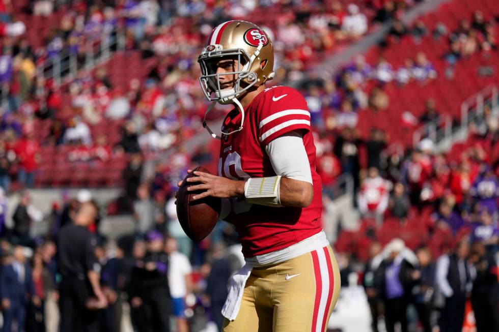 San Francisco 49ers quarterback Jimmy Garoppolo (10) warms up before an NFL divisional playoff ...