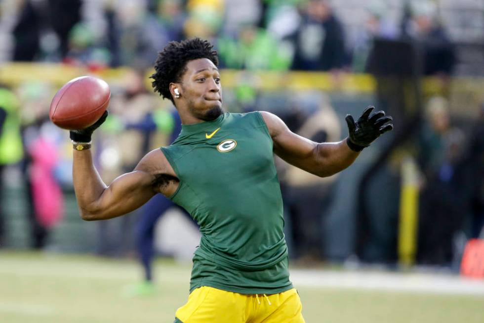 Green Bay Packers' Darnell Savage warms up before an NFL divisional playoff football game again ...