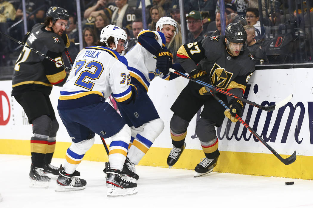 Golden Knights' left wing Max Pacioretty (67) skates with the puck past St. Louis Blues' St. Lo ...