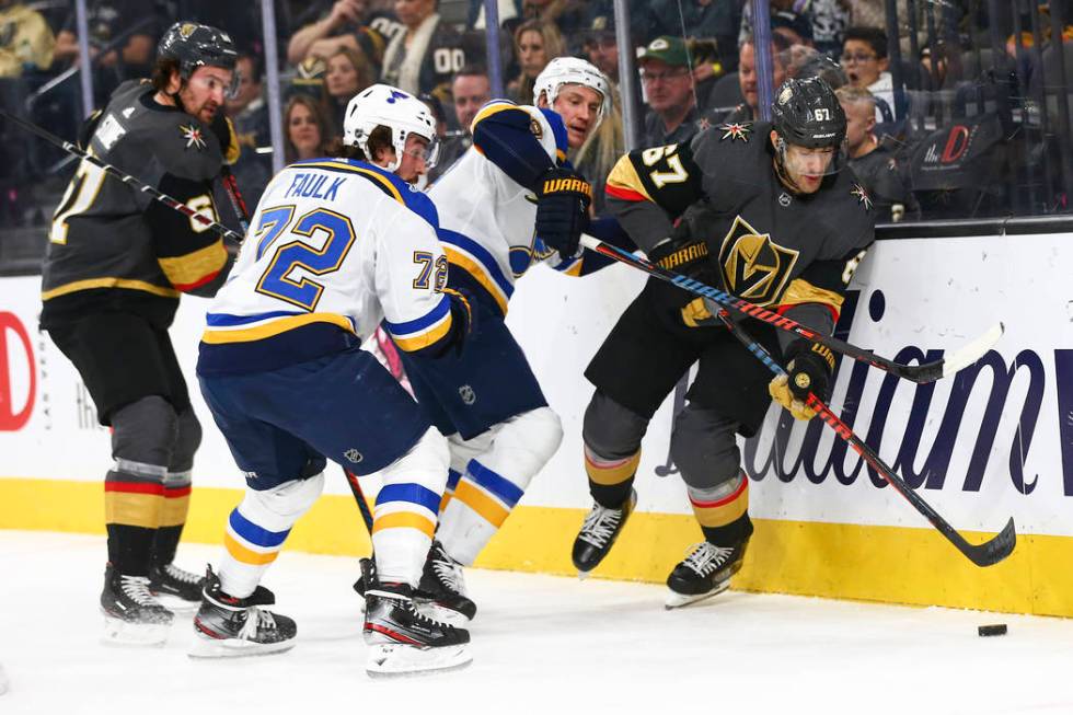 Golden Knights' left wing Max Pacioretty (67) skates with the puck past St. Louis Blues' St. Lo ...