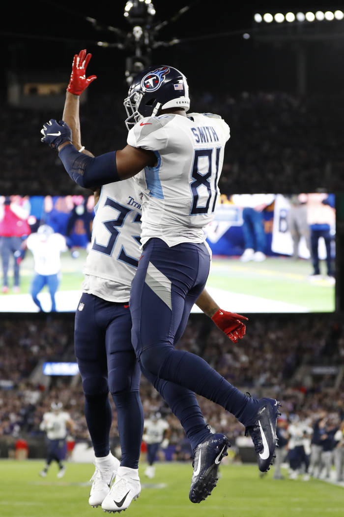 Tennessee Titans tight end Jonnu Smith (81) celebrates his touchdown catch with Tennessee Titan ...
