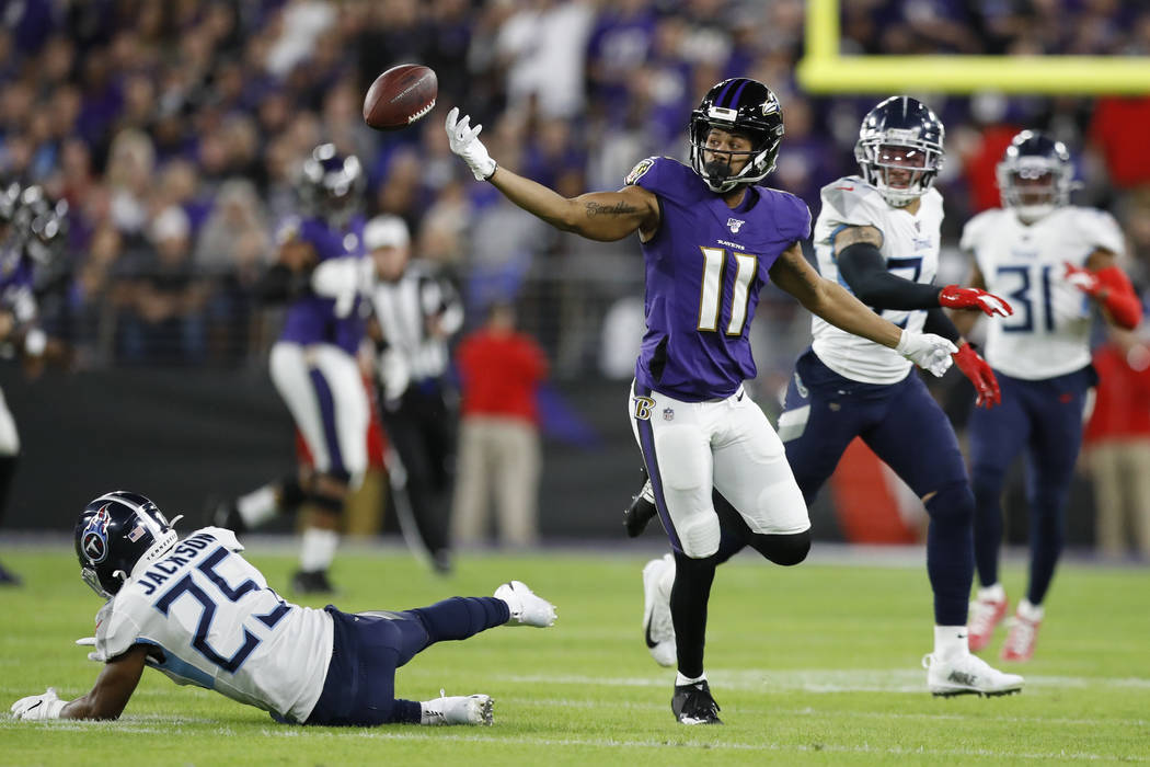 Baltimore Ravens wide receiver Seth Roberts (11) can't catch a pass as he is covered by Tenness ...
