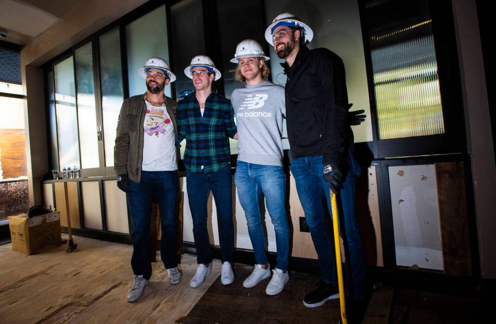 Golden Knights players, from left, Deryk Engelland, Reilly Smith, William Karlsson and Alex Tuc ...